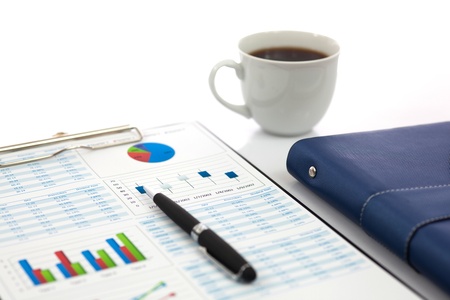 Business report with cup of coffeeの写真素材