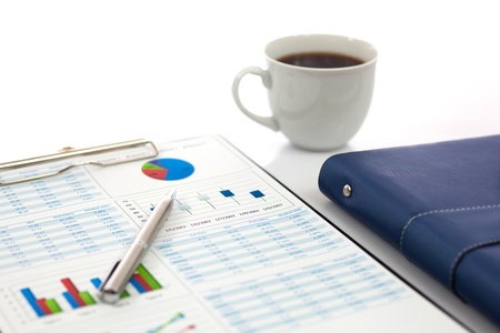 Business report with cup of coffeeの写真素材