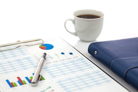 Business report with cup of coffeeの写真素材