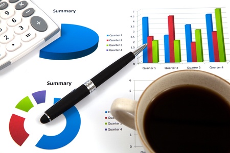 Business report with cup of coffeeの写真素材
