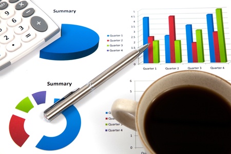 Business report with cup of coffeeの写真素材