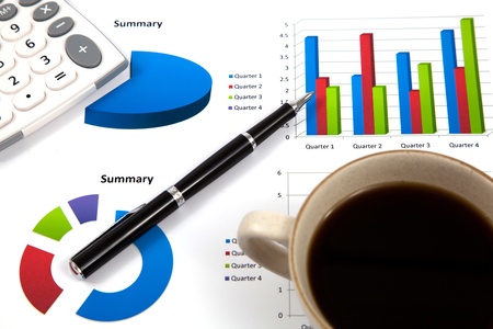 Business report with cup of coffeeの写真素材