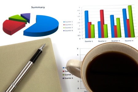 Business report with cup of coffeeの写真素材