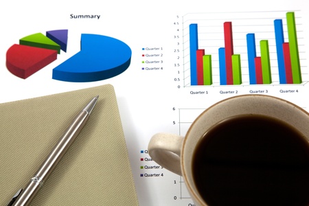 Business report with cup of coffeeの写真素材