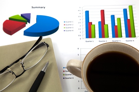 Business report with cup of coffeeの写真素材