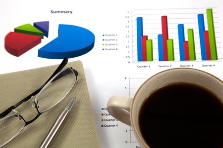Business report with cup of coffeeの写真素材