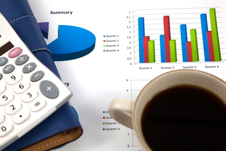 Business report with cup of coffeeの写真素材