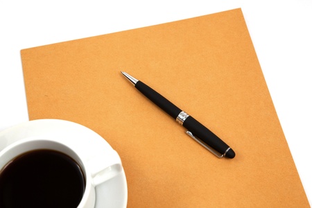 folder with coffee cup on tableの写真素材