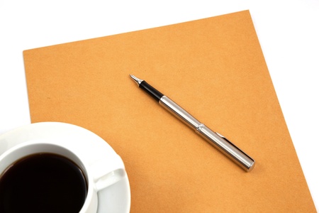 folder with coffee cup on tableの写真素材