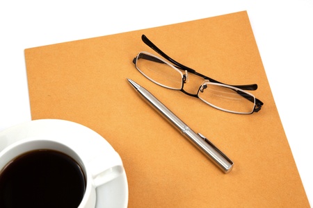 folder with coffee cup on tableの写真素材