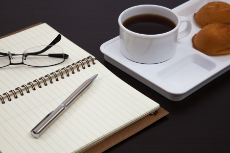 Cup of coffee and bookの写真素材