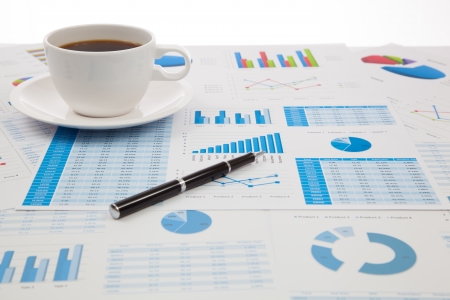 Business report with cup of coffeeの写真素材