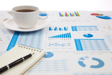 Business report with cup of coffeeの写真素材