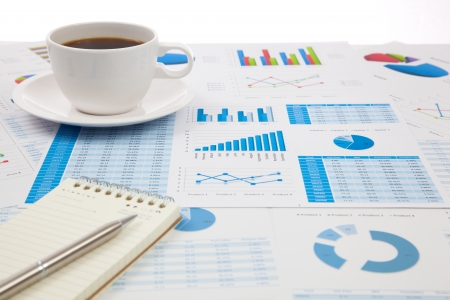 Business report with cup of coffeeの写真素材