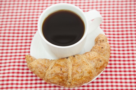 Croissant and a cup of coffeeの写真素材