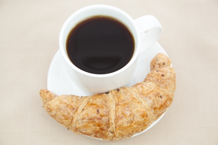 Croissant and a cup of coffeeの写真素材