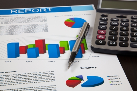 Financial graphs and charts on tableの写真素材