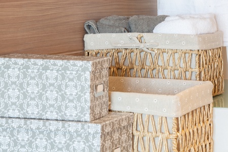 basket of towels on woodenの写真素材