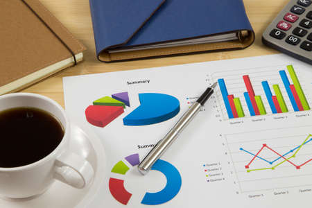 Worktable covered with business report