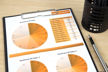 Graphs, charts, business report on table.の写真素材