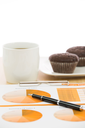 Financial report with calculator on tableの写真素材