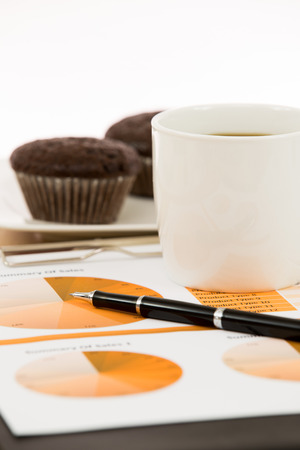 Financial report with calculator on tableの写真素材
