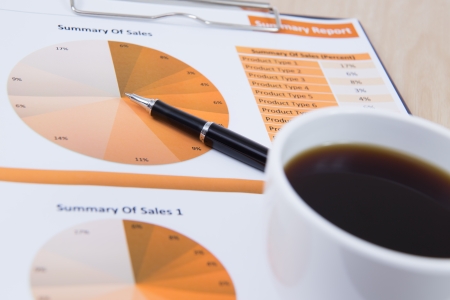 Financial report with calculator on tableの写真素材