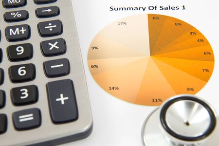 Showing business and financial with calculatorの写真素材