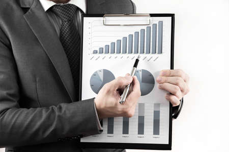 Businessman showing a positive graph. isolated on white