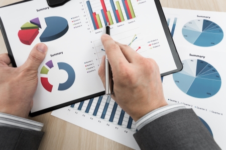 Business chart showing financial success on tableの写真素材