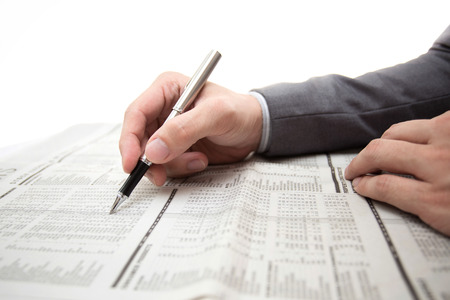 Hand with finance report and accounting business.の写真素材