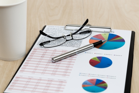 Financial graphs and charts on tableの写真素材