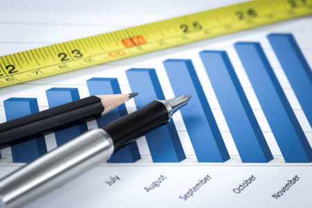 Showing business with financial report and measuring tape. Accountingの写真素材