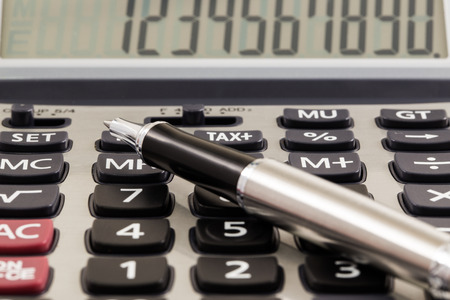 close up calculator with penの写真素材