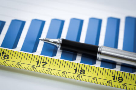 Showing business with financial report and measuring tape. Accountingの写真素材