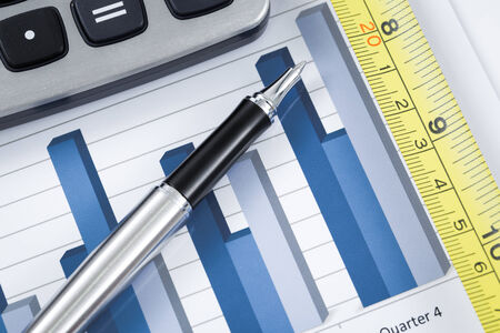 Showing business with financial report and measuring tape. Accountingの写真素材