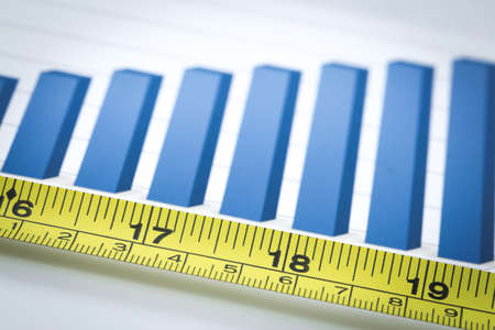 business with financial report and measuring tapeの写真素材