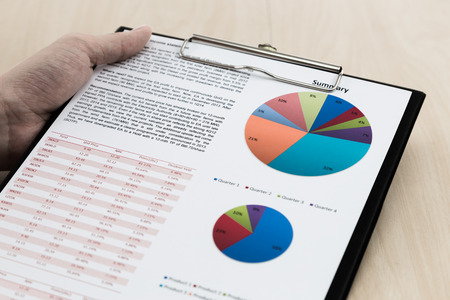 Financial graphs and charts on tableの写真素材