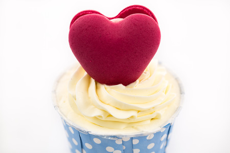 Tasty cupcake with butter cream on white backgroundの写真素材