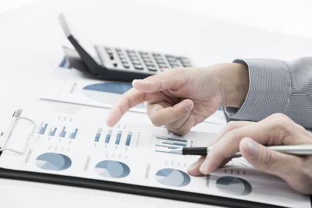 Business people discussing during a meeting on tableの写真素材