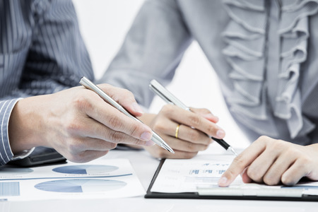 Business people discussing during a meeting on tableの写真素材