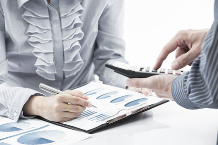 Business people discussing during a meeting on tableの写真素材