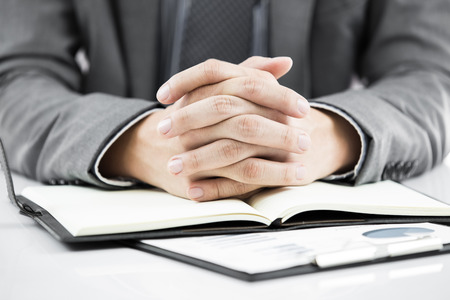business report and man hand with pen. Accountingの写真素材
