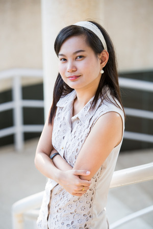 Portrait of a successful business woman smiling. Beautiful young femaleの写真素材