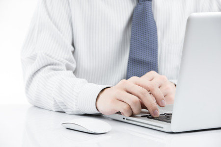 Close-up of Businessman using laptopの写真素材