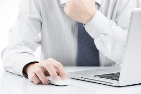 Close-up of Businessman using laptopの写真素材