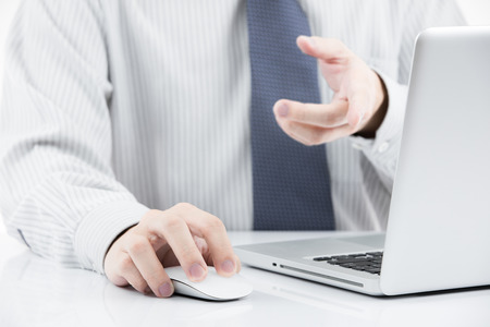 Close-up of Businessman using laptopの写真素材