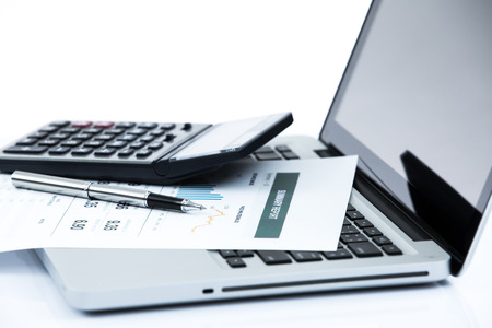 Businessman analyzing investment charts with laptop. Accountingの写真素材