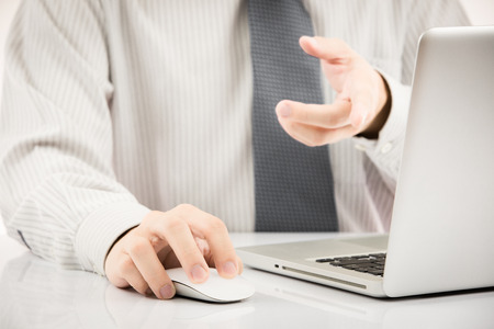 Close-up of Businessman using laptopの写真素材