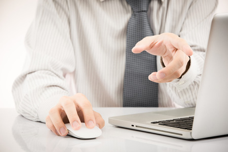 Close-up of Businessman using laptopの写真素材